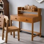 Rich honey oak finish solid wood student writing desk paired with a cute wooden chair