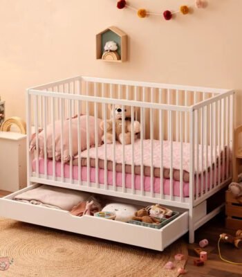 Elegant Sheesham wood baby crib with a non-toxic finish, smooth edges, and durable construction
