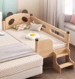 Natural solid wood panda-themed toddler co-sleeper bed featuring an attached 2-step ladder, guardrails, and carved panda-ear headboard placed beside an adult bed.