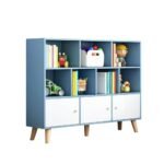 Nordic-style blue wooden kids storage cabinet featuring six open toy display cubbies and three white lower cabinet doors on splayed legs.