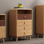 Full front view of a natural solid wood accent chest with an open display cubby, four storage drawers, and splayed legs in a modern interior setting.