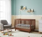 Convertible Baby Crib walnut finish that can be used as a toddler bed