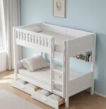 Minimalist white painted wooden twin-over-twin bunk bed with a straight climbing ladder, safety guardrails on the upper bunk, an integrated side bookshelf, and spacious under-bed storage drawers on a light wood floor.
