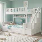 Modern white wooden twin bunk bed featuring integrated side storage stairs, a full-length built-in display shelf lined with plush toys, and large pull-out under-bed drawers in a light teal nursery.