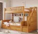 Premium pine finish solid wood twin bunk bed with integrated right-side storage stairs, a long open display shelf showcasing plush toys, and dual seamless under-bed pull-out drawers.