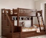 Medium walnut finish solid wood twin-over-twin bunk bed featuring a left-side storage staircase and a right-side slanted ladder, space saving kids room furniture with under-bed drawers.