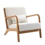 Cream off-white fabric lounge chair with natural light wood frame and rectangular lumbar pillow studio shot