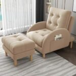 Soft beige plush recliner chair and footrest set accessorized with a cloud pillow in a cozy bedroom window reading nook.