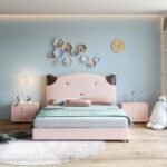 Front angle of the Amyzel pink solid wood kids bed frame featuring a cute bear-ear headboard and twin pink nightstands.