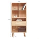 Product size dimensions for Amyzel natural solid wood kids bookcase featuring open shelf cubbies, center drawer, and tapered legs.