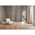 Japandi minimalist natural wood frame lounge armchair with thick white cushions in bright open room staging