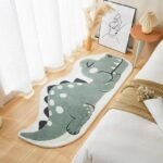 Premium thick pile green dinosaur shaped area rug for children's playroom, cute non-slip cartoon animal floor carpet for toddler bedroom decoration.
