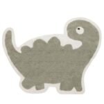 Close up view of Amyzel dinosaur shaped children's rug, plush green animal floor mat with plush toddler toys and puzzle blocks in playroom corner.